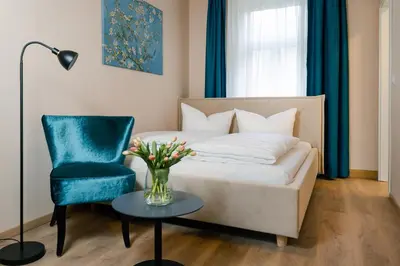 Ein Bett oder Betten in einem Zimmer der Unterkunft Waldidylle Gohrisch, Pension & Ferienwohnung Garni, Sächsische Schweiz