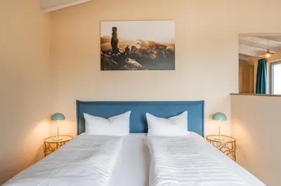 Ein Bett oder Betten in einem Zimmer der Unterkunft Waldidylle Gohrisch, Pension & Ferienwohnung Garni, Sächsische Schweiz