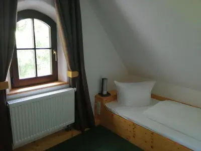 Ein Bett oder Betten in einem Zimmer der Unterkunft Ferienhaus Mutter Anna's Refugium