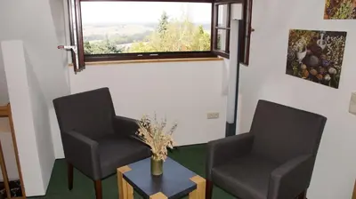 Ein Sitzbereich in der Unterkunft Ferienhaus Mutter Anna's Refugium