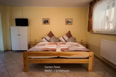 Ein Bett oder Betten in einem Zimmer der Unterkunft Hohlfeld´s Ferienwohnung