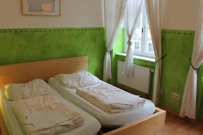 Ein Bett oder Betten in einem Zimmer der Unterkunft Hostel Louise 20