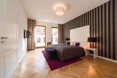 Ein Bett oder Betten in einem Zimmer der Unterkunft Modernes Apartment am Neumarkt