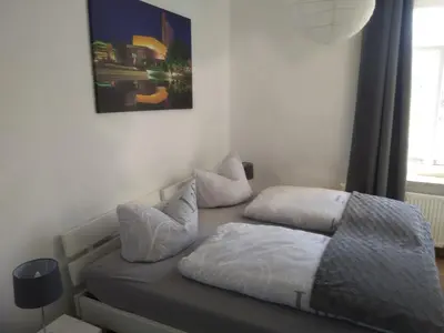 Ein Bett oder Betten in einem Zimmer der Unterkunft Ferienwohnung Rudi