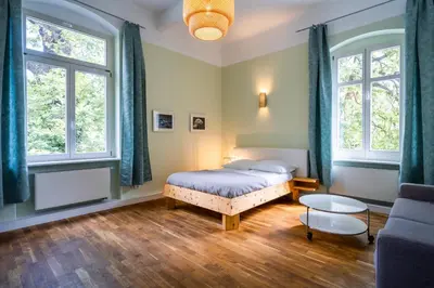 Ein Bett oder Betten in einem Zimmer der Unterkunft Villa Schmidt