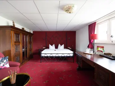 Ein Bett oder Betten in einem Zimmer der Unterkunft Hotel Zum Vetter