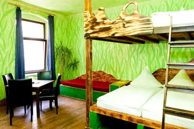 Ein Bett oder Betten in einem Zimmer der Unterkunft Gästehaus Mezcalero