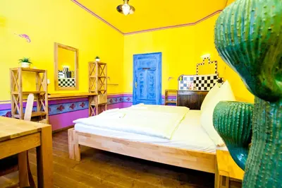 Ein Bett oder Betten in einem Zimmer der Unterkunft Gästehaus Mezcalero