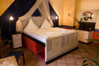 Ein Bett oder Betten in einem Zimmer der Unterkunft Gästehaus Mezcalero