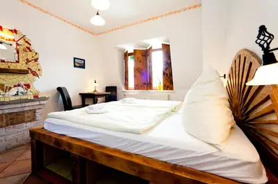 Ein Bett oder Betten in einem Zimmer der Unterkunft Gästehaus Mezcalero