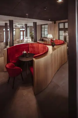 Ein Sitzbereich in der Unterkunft alexxanders Hotel & Boardinghouse, Restaurant