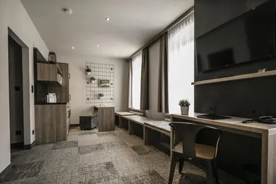 TV/Unterhaltungsangebot in der Unterkunft alexxanders Hotel & Boardinghouse, Restaurant