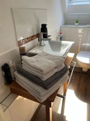 Ein Bett oder Betten in einem Zimmer der Unterkunft Süße kleine Ferienwohnung
