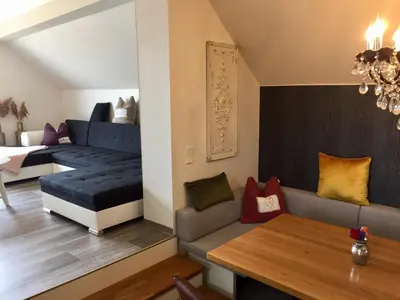 Ein Sitzbereich in der Unterkunft Ferienwohnung Schwalbennest-Großkoschen