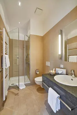 Ein Badezimmer in der Unterkunft Hotel Elbresidenz an der Therme
