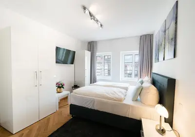 Ein Bett oder Betten in einem Zimmer der Unterkunft Familienapartment mit Blick zur Frauenkirche