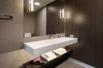 Ein Badezimmer in der Unterkunft Moxy Dresden Neustadt