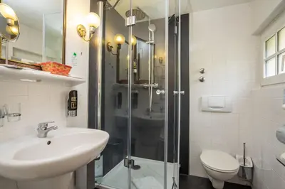 Ein Badezimmer in der Unterkunft Hotel Sonne
