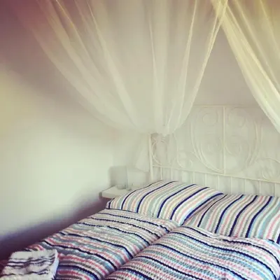 Ein Bett oder Betten in einem Zimmer der Unterkunft Feriendomizil Mikesh