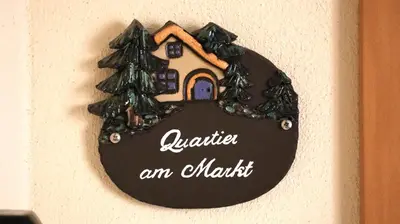 Ein Zertifikat, Auszeichnung, Logo oder anderes Dokument, das in der Unterkunft Quartier am Markt- Ferienwohnung ausgestellt ist