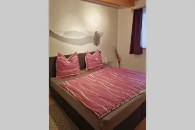 Ein Bett oder Betten in einem Zimmer der Unterkunft Quartier am Markt- Ferienwohnung