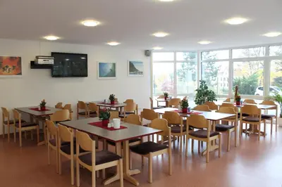 Ein Restaurant oder anderes Speiselokal in der Unterkunft Sportpension Dresden
