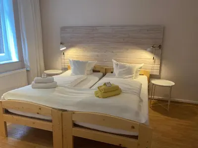 Ein Bett oder Betten in einem Zimmer der Unterkunft Hotel-Pension Mandy - Adults Only