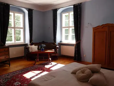 Ein Bett oder Betten in einem Zimmer der Unterkunft Schloss Triestewitz