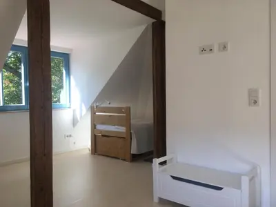 Ein Bett oder Betten in einem Zimmer der Unterkunft Prima Klima Villa - Ferienwohnung Wilke Aussicht
