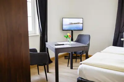 Ein Bett oder Betten in einem Zimmer der Unterkunft Fliegerhorst