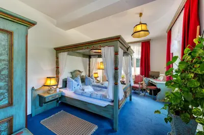 Ein Bett oder Betten in einem Zimmer der Unterkunft Hotel Seiffener Hof***