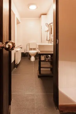 Ein Bett oder Betten in einem Zimmer der Unterkunft Hotel Aviv Dresden