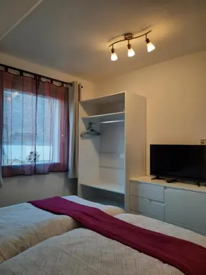 Ein Bett oder Betten in einem Zimmer der Unterkunft Ferienwohnung Ostrau