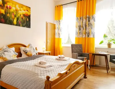 Ein Bett oder Betten in einem Zimmer der Unterkunft Pension Haus Anna