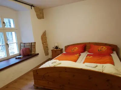 Ein Bett oder Betten in einem Zimmer der Unterkunft Gästehaus Vergissmeinnicht
