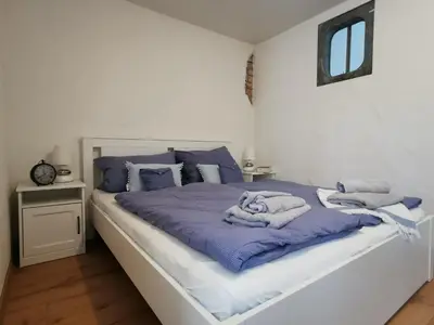 Ein Bett oder Betten in einem Zimmer der Unterkunft Gästehaus Vergissmeinnicht