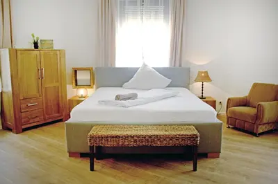 Ein Bett oder Betten in einem Zimmer der Unterkunft Apartment Eva