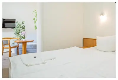 Ein Bett oder Betten in einem Zimmer der Unterkunft Hotel Hähnel