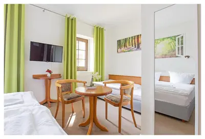 Ein Bett oder Betten in einem Zimmer der Unterkunft Hotel Hähnel