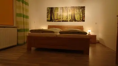 Ein Bett oder Betten in einem Zimmer der Unterkunft Ferienwohnung Erzgebirgswohnung Götze