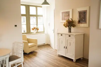 Ein Sitzbereich in der Unterkunft Urlaubsfreude Biedermann Haus Blumenglück - Hortensie