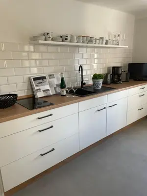 Küche/Küchenzeile in der Unterkunft Ferienwohnung am Elberadweg
