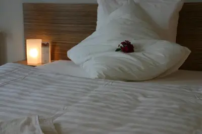 Ein Bett oder Betten in einem Zimmer der Unterkunft Ferienhof Dittrichs Erben