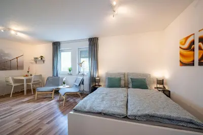 Ein Bett oder Betten in einem Zimmer der Unterkunft EG Wohnung, zentral, TOP Anbindung, mit großer Terrasse