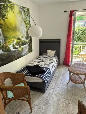 Ein Bett oder Betten in einem Zimmer der Unterkunft MyHome Einsiedel an der Zwönitz 1