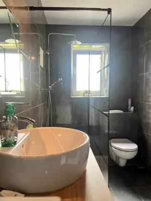 Ein Badezimmer in der Unterkunft MyHome Einsiedel an der Zwönitz 1