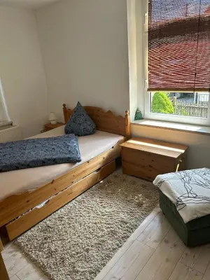 Ein Bett oder Betten in einem Zimmer der Unterkunft MyHome Einsiedel an der Zwönitz 1