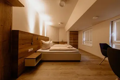 Ein Bett oder Betten in einem Zimmer der Unterkunft Bergpension Laasen Perle Rathen
