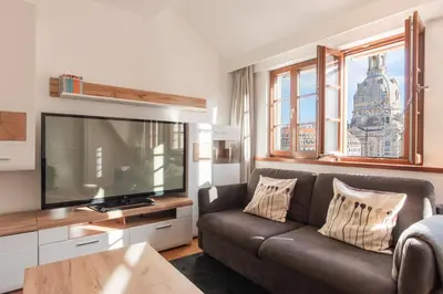 Ein Sitzbereich in der Unterkunft Familienapartment An der Frauenkirche