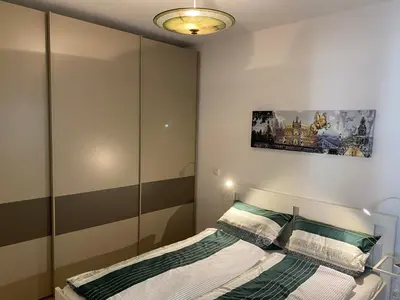Ein Bett oder Betten in einem Zimmer der Unterkunft Dresden zum Verweilen